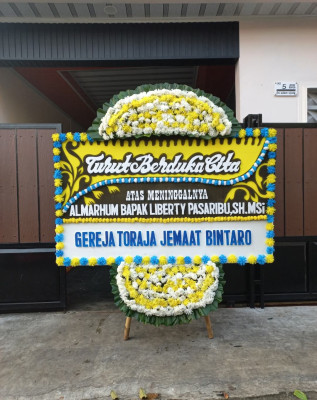 Papan Bunga Duka di Langgam